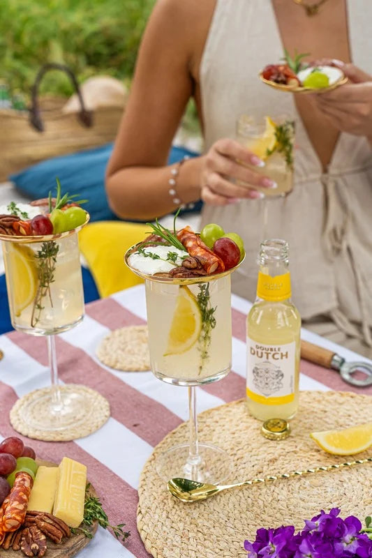 Lemon pitcher with cold meats and snacks